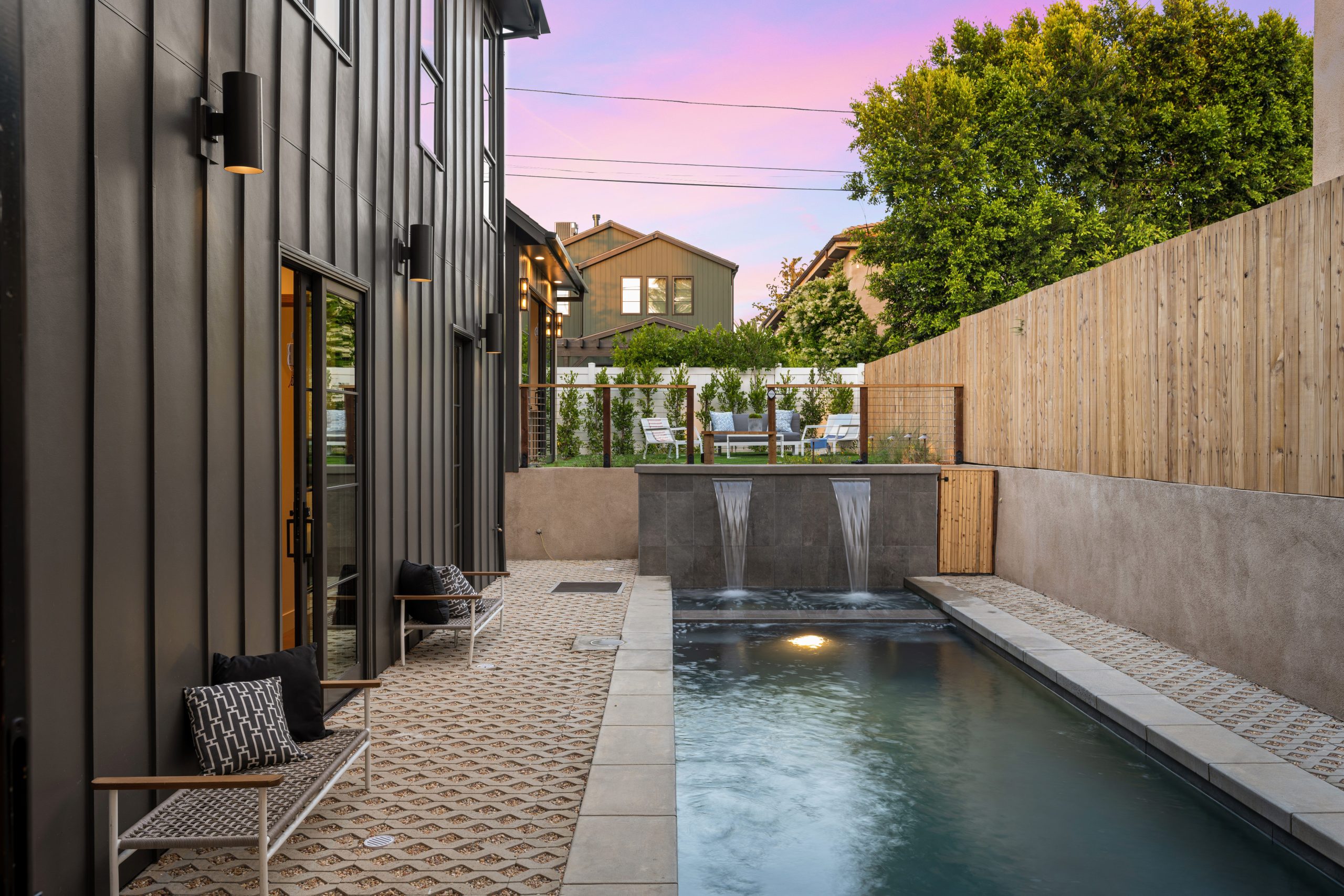 A modern backyard pool with a sleek design